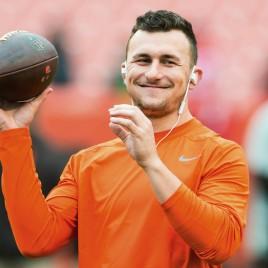 Former Heisman Trophy Winner Johnny Manziel Holds Super Bowl Autograph Signing